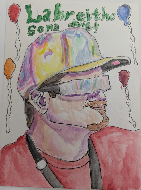 My friend Cillian wearing wrap around shades and a reflective colorful hat.